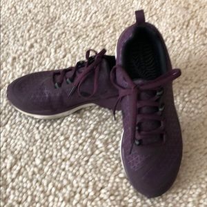 Purple Puma running shoes
